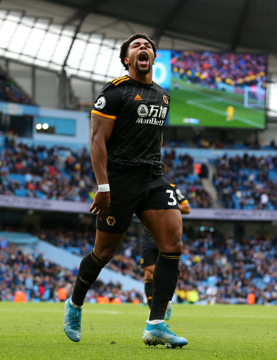 MANCHESTER, ENGLAND - OCTOBER 06:  Adama Traore of Wolverhampton Wanderers celebrates after scoring his team's second goal during the Premier League match between Manchester City and Wolverhampton Wanderers at Etihad Stadium on October 06, 2019 in Manchester, United Kingdom. (Photo by Alex Livesey/Getty Images)