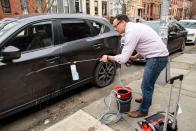 <p>Car cleaning is another part of our pressure washer test. Models with detergent tanks and brush attachments are well-suited to the task. This battery-powered pressure washer eliminates the power cord and it can suction water from a bucket, good for homeowners who can't park near a garden hose or wall outlet. </p>