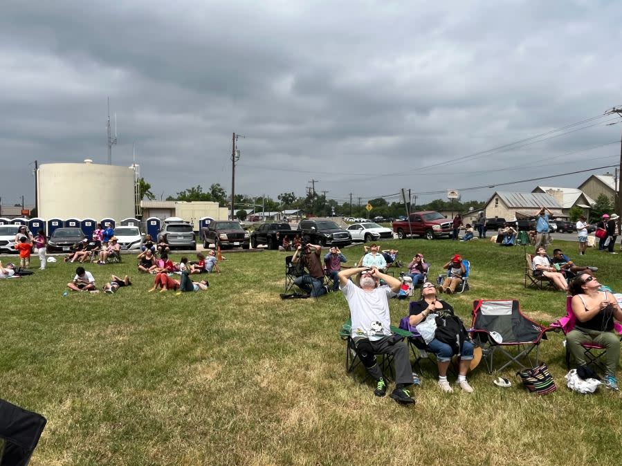 Folks experience the total eclipse at Veterans Memorial Park in Dripping Springs, Texas, on April 8, 2024. (KXAN Photo/Kristen Currie)