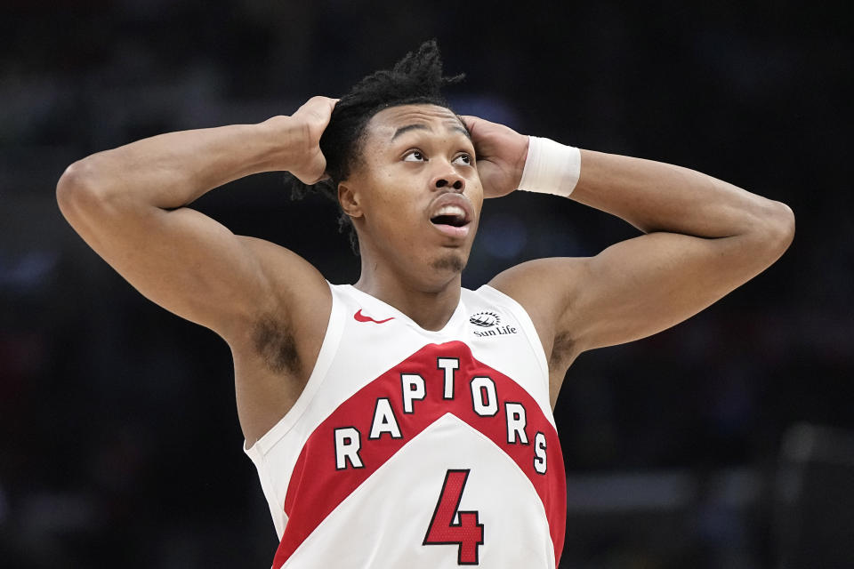 Toronto Raptors forward Scottie Barnes grabs his hair as timeout is called after turning over the ball during the second half of an NBA basketball game against the Los Angeles Clippers Wednesday, Jan. 10, 2024, in Los Angeles. (AP Photo/Mark J. Terrill)