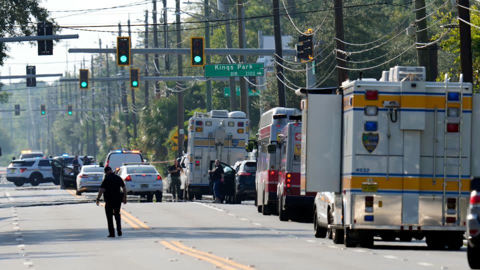 Authorities respond to the scene of a shooting at a Dollar General store, Saturday, Aug. 26, 2023, in Jacksonville, Fla. - John Raoux/AP