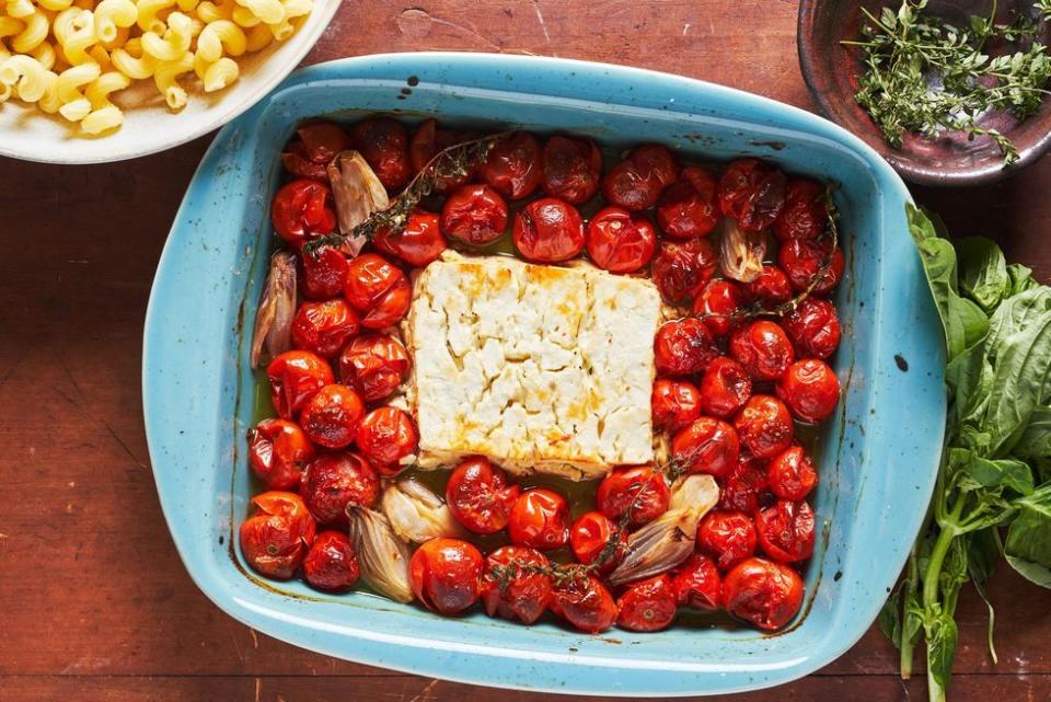 <p>Yes, THAT viral TikTok recipe... </p><p>Get the <a href="https://www.delish.com/uk/cooking/recipes/a35426947/baked-feta-pasta-tiktok/" rel="nofollow noopener" target="_blank" data-ylk="slk:Baked Feta Pasta;elm:context_link;itc:0;sec:content-canvas" class="link ">Baked Feta Pasta</a> recipe. <br><br></p>