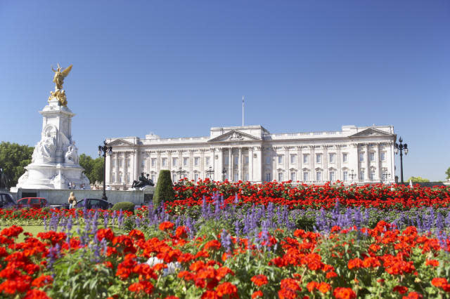 Buckingham Palace With Flowers Blooming In The Queen's Garden, London, England