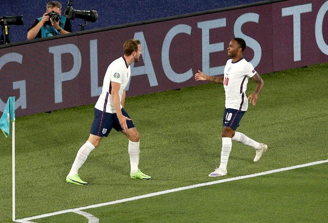 Harry Kane, left, celebrates with Raheem Sterling after scoring against Ukraine