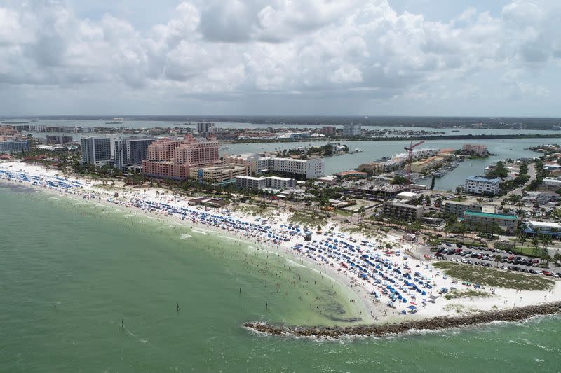 Sun seekers gather at Clearwater Beach on Independence Day