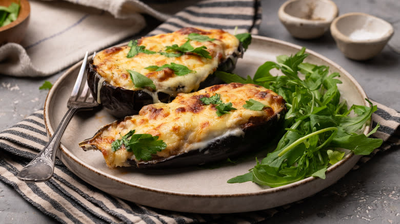 turkey and cheese stuffed eggplants on plate