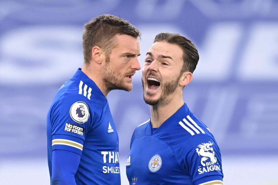 Jamie Vardy celebrates with James Maddison after scoring Leicester’s second equaliser against Manchester United (Reuters)