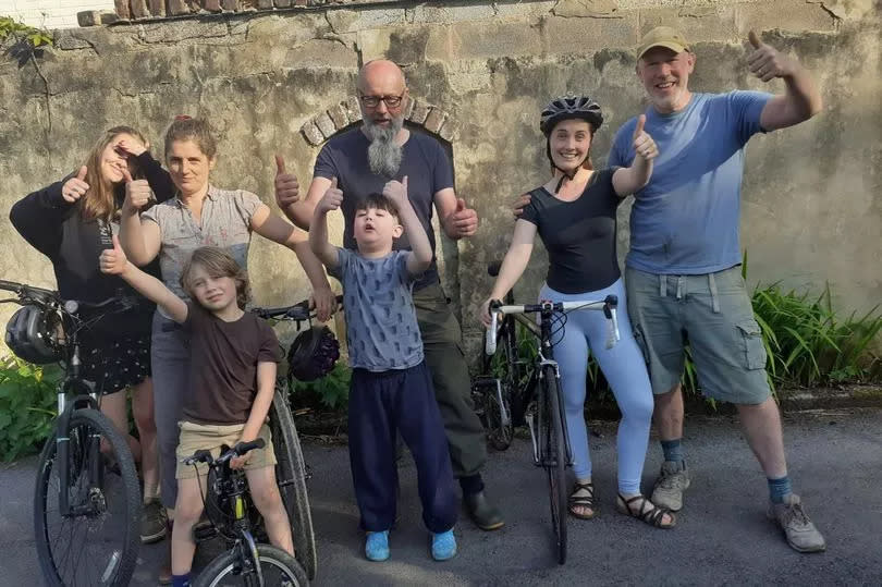 Aubrey Rothery, centre, with friend Senan Rose-Maris who organised a sponsored bike ride