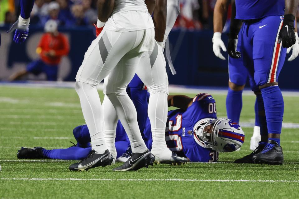 Buffalo Bills cornerback Dane Jackson (30) reacts after an injury during the first half of an NFL football game against the Tennessee Titans, Monday, Sept. 19, 2022, in Orchard Park, N.Y. (AP Photo/Jeffrey T. Barnes)