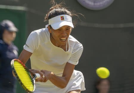 Jul 7, 2018; London, United Kingdom; Su-Wei Hsieh (TAI) in action during her match against Simona Halep (ROU) on day six at the All England Lawn and Croquet Club. Mandatory Credit: Susan Mullane-USA TODAY Sports