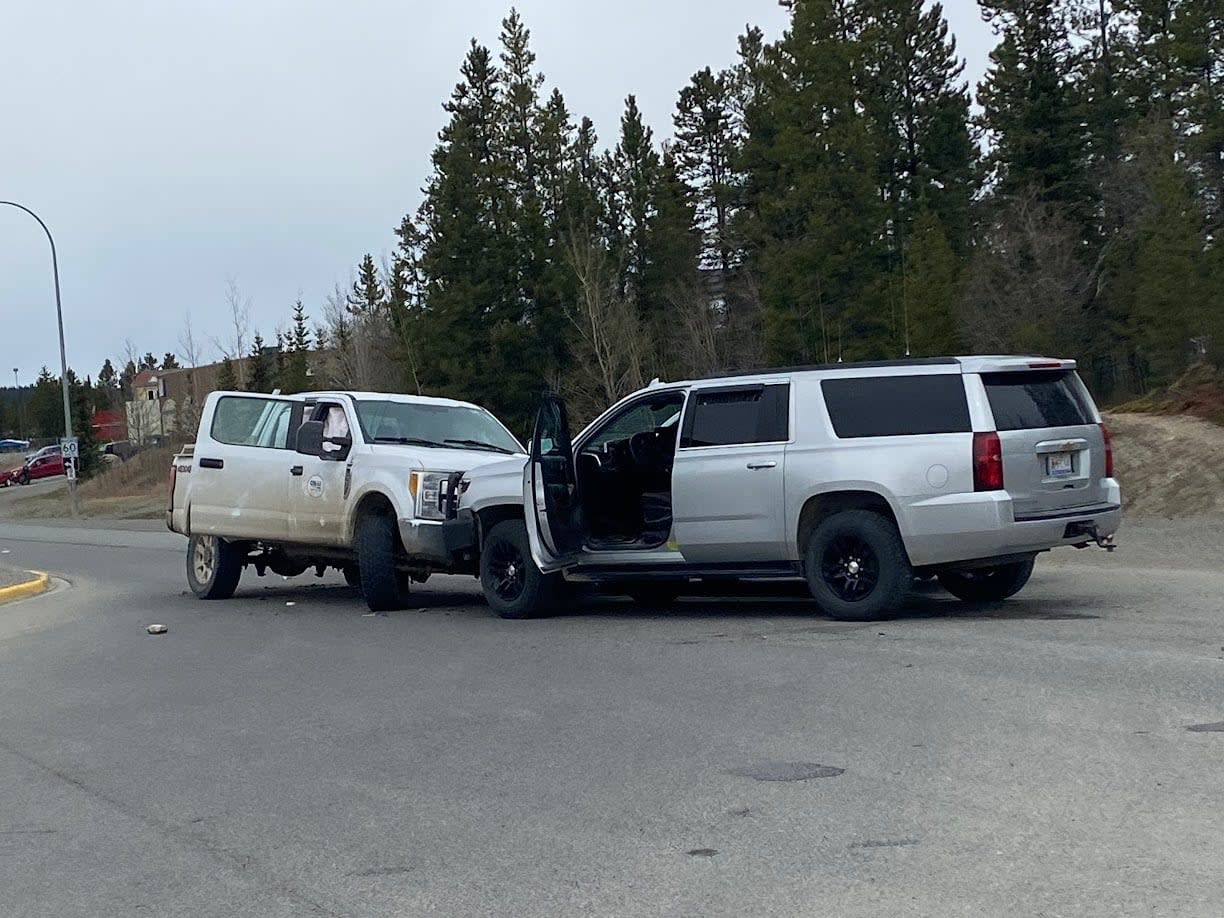 RCMP disabled a stolen vehicle in Whitehorse's Granger neighbourhood on Monday afternoon, after an alleged armed robbery. (Gabrielle Plonka/CBC - image credit)