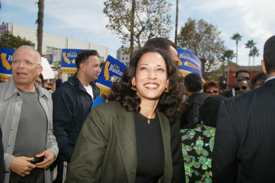Kamala Harris meets with supporters in front of the 24th street BART station while on the campaign trail with Cruz Bustamonte on Oct. 4, 2003. Harris was running for District Attorney in San Francisco. | Mike Kepka—San Francisco Chronicle/Getty Images