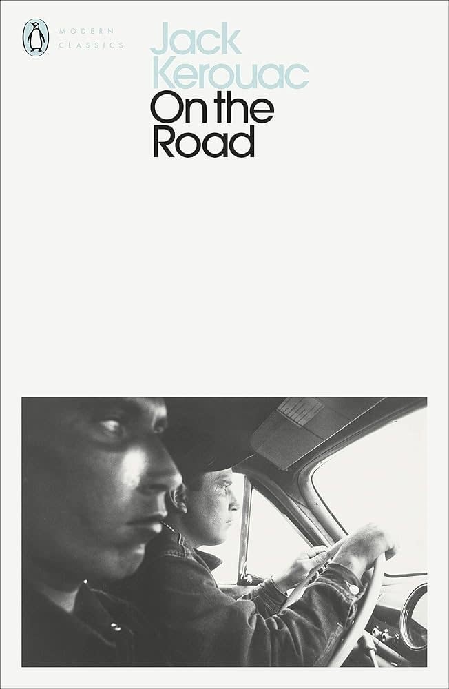 Book cover of "On the Road" by Jack Kerouac featuring two men in a car; one is driving