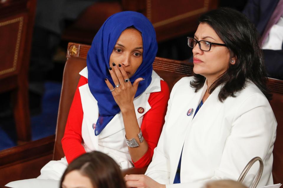 Rep. Ilhan Omar, D-Minn., left, and Rep. Rashida Tlaib, D-Mich, at the State of the Union on Feb. 5, 2019.