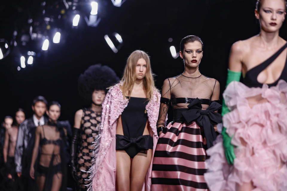 A model wears a creation as part of the Valentino Haute Couture Spring-Summer 2023 collection presented in Paris, Wednesday, Jan. 25, 2023. (AP Photo/Lewis Joly)