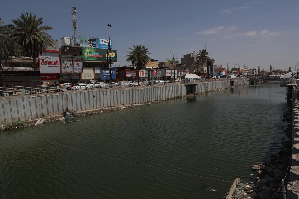 In this Saturday, July, 20, 2019 photo, wastewater flows in central Basra, Iraq. A leading human rights organization has accused Iraqi authorities of failing to properly address underlying causes for an ongoing water crisis in Iraq's southern region. A report issued Monday by Human Rights Watch on the chronic water shortages and pollution in Iraq's Basra province says authorities continue to allow activities that pollute Basra's water resources despite the health risks to residents. (AP Photo/Nabil al-Jurani)