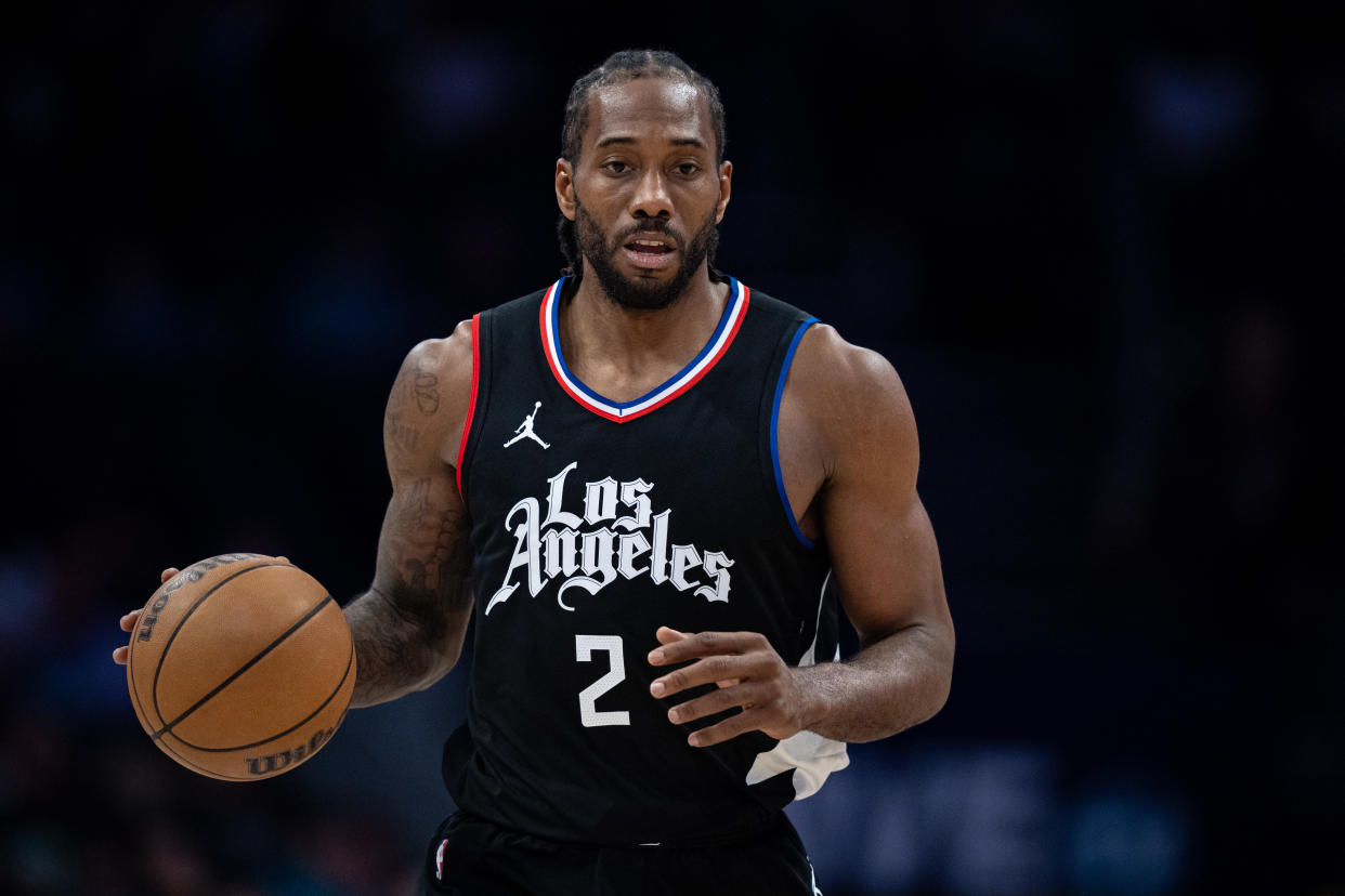 CHARLOTTE, NORTH CAROLINA - MARCH 31: Kawhi Leonard #2 of the LA Clippers brings the ball up court against the Charlotte Hornets during their game at Spectrum Center on March 31, 2024 in Charlotte, North Carolina. NOTE TO USER: User expressly acknowledges and agrees that, by downloading and or using this photograph, User is consenting to the terms and conditions of the Getty Images License Agreement. (Photo by Jacob Kupferman/Getty Images)