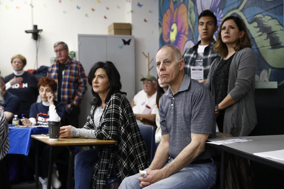 Caucus-goers listen to a precinct leader at a caucus location at Coronado High School in Henderson, Nev., Saturday, Feb. 22, 2020. (AP Photo/Patrick Semansky)