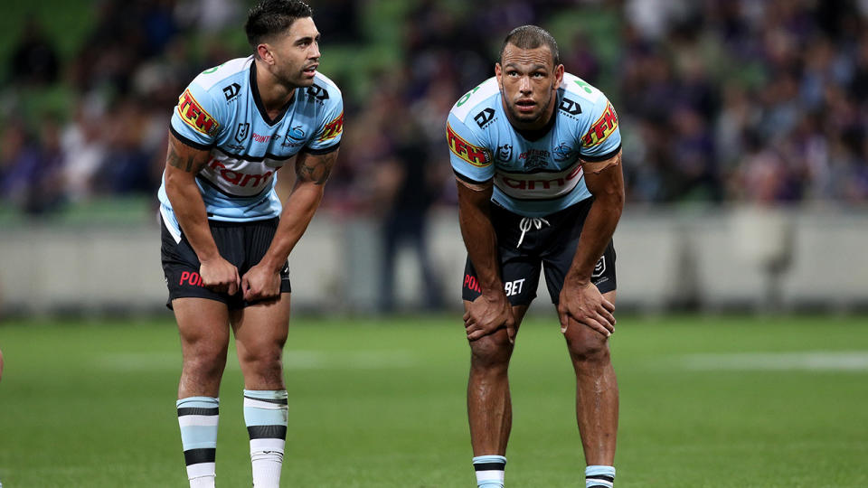 Shaun Johnson and Will Chambers look towards the scoreboard during the round eight NRL match between the Melbourne Storm and Cronulla Sharks at AAMI Park on April 30, 2021 in Melbourne, Australia. (Photo by Speed Media/Icon Sportswire via Getty Images)