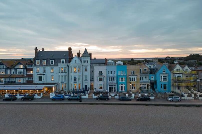 Colourful townhouses seen during dusk at the English seaside resort of Aldeburgh, Suffolk.