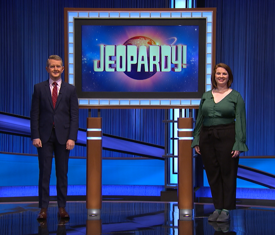 Brigid Hogan of Ephraim, right, poses on the stage of the quiz show "Jeopardy!" with host Ken Jennings, who's won more games on the show (74) than anyone. Hogan appeared on the show Jan. 11, 2022, but lost to Amy Schneider, who extended her winning streak to 30, fourth-highest in the show's history, on that episode.