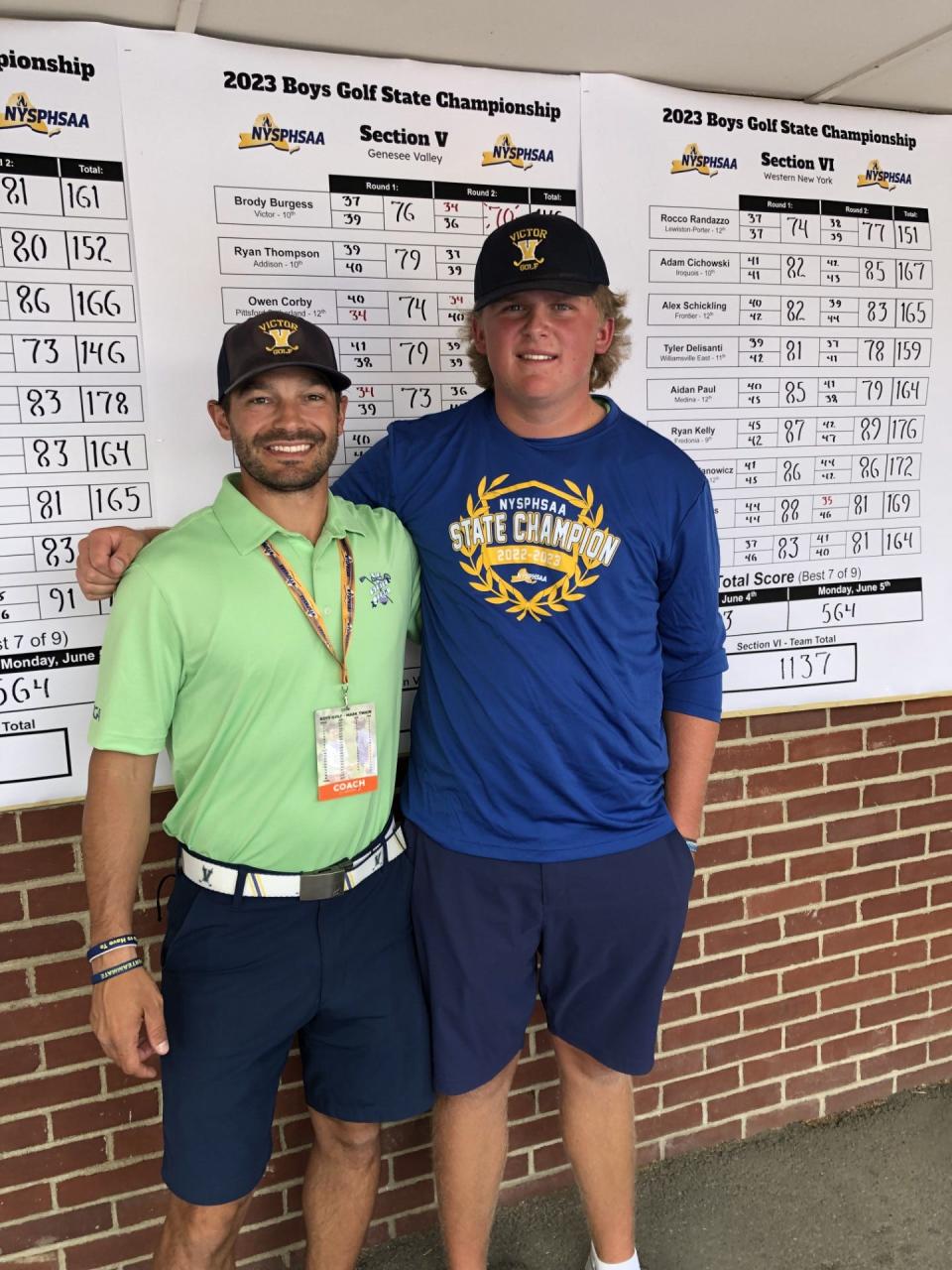 Victor sophomore Brody Burgess (right) with coach Trevor Sousa. Burgess was the NYSPHSAA runner-up after forcing a playoff with eventual champion Dante Bertoni of Union-Endicott.