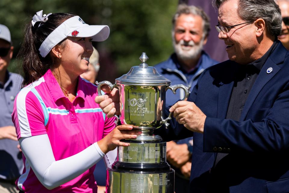 Mike Bailey, president of the Utah Golf Association, awards the 2023 trophy to Tess Blair at the Utah Women’s State Amateur Championship at Jeremy Ranch Golf and Country Club in Park City on Friday, Aug. 4, 2023.