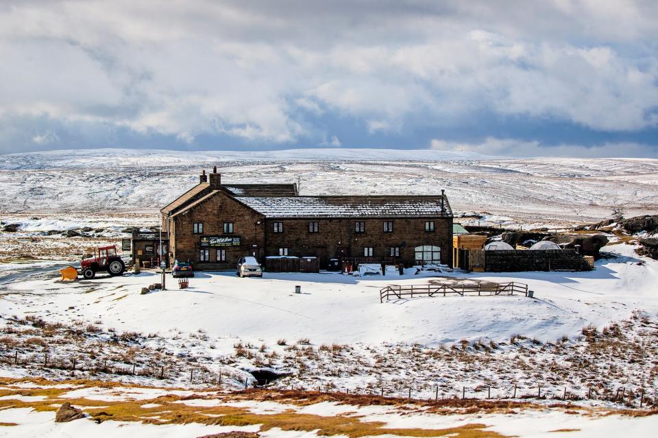 Spring weather Mar 13th 2021. The Tan Hill Inn in the Yorkshire Dales National Park, following fresh snow fall overnight. Picture date: Saturday March 13, 2021. Photo credit should read: Danny Lawson/PA Wire URN:58581079 (Press Association via AP Images)
