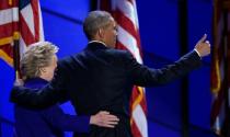 To loud cheers President Barack Obama told delegates at the Democratic convention "We're going to carry Hillary to victory this fall, because that's what the moment demands"