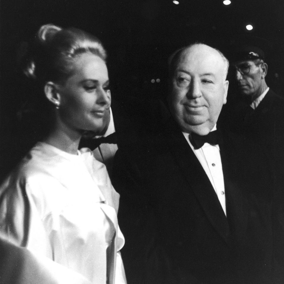 Alfred Hitchcock and Tippi Hedren at the 1963 Cannes Film Festival - Getty Images