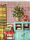 <p>Use an old vintage tin from your attic or basement as a container for a tiny Christmas tree. </p><p><a class="link " href="https://www.amazon.com/s?k=small+pennants&ref=nb_sb_noss_1&tag=syn-yahoo-20&ascsubtag=%5Bartid%7C10050.g.28746492%5Bsrc%7Cyahoo-us" rel="nofollow noopener" target="_blank" data-ylk="slk:SHOP PENNANTS;elm:context_link;itc:0;sec:content-canvas">SHOP PENNANTS</a></p>