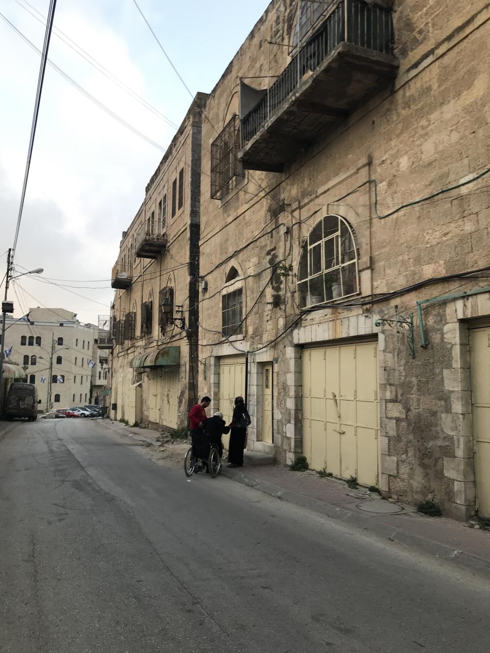 Some Palestinians still live in downtown Hebron in the occupied West Bank, near streets where they haven't been allowed to walk for years. (Photo: Akbar Shahid Ahmed)