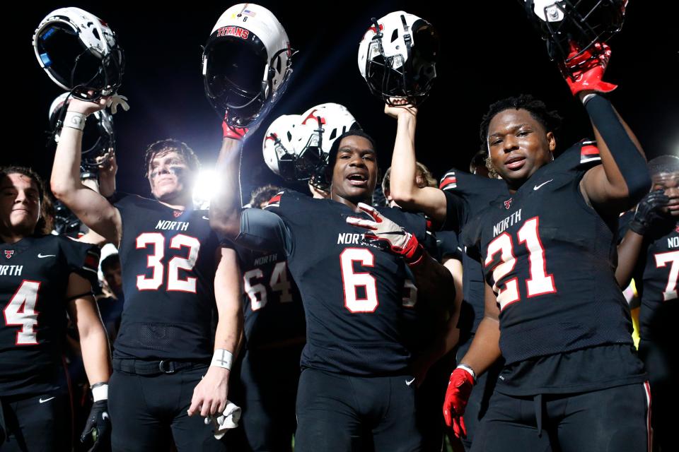 North Oconee players celebrate after a GHSA high school football game between Madison County and North Oconee in Bogart, Ga., on Friday, Sept. 24, 2021. North Oconee won 28-0.