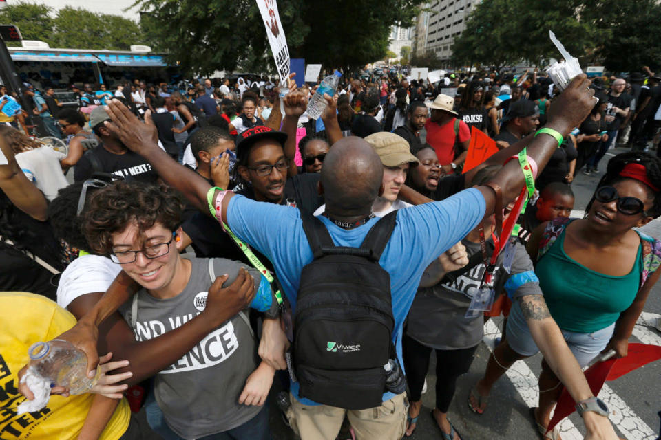 <p>Marchers rally outside Bank of America stadium during an NFL game to protest the police shooting of Keith Scott in Charlotte, N.C., on Sept. 25, 2016. (Jason Miczek/Reuters)</p>