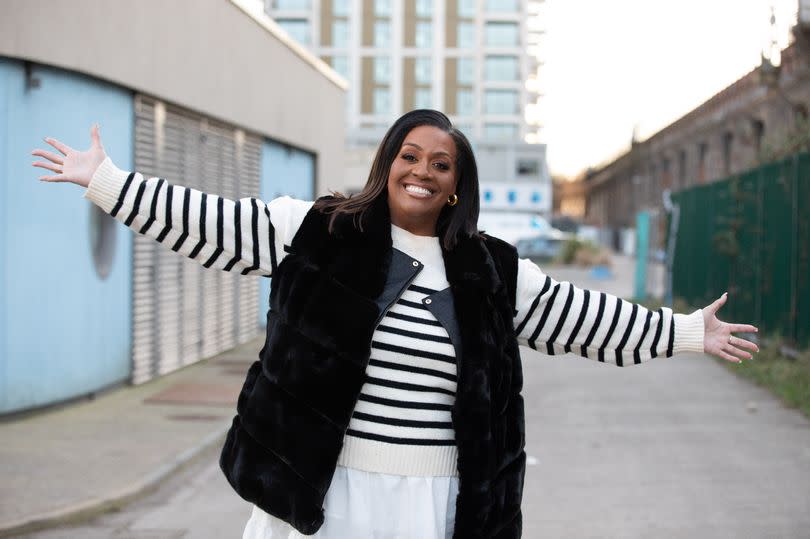 Alison Hammond in a black and white striped jumper