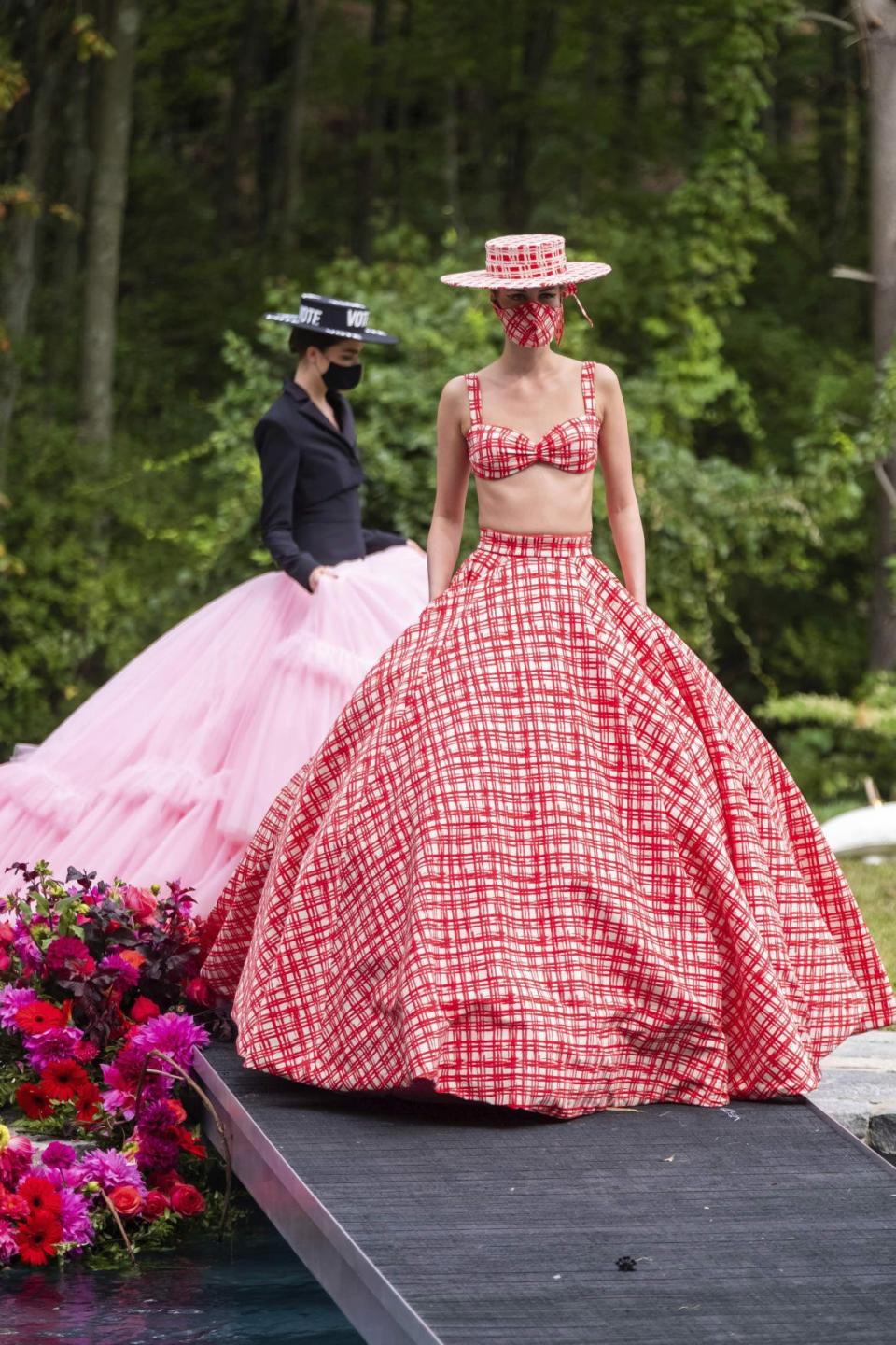 <div class="inline-image__caption"><p>Models at Christian Siriano's show at his Westport, Conn. home.</p></div> <div class="inline-image__credit">Charles Sykes/AP</div>