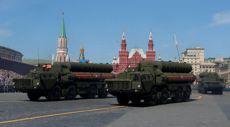 FILE PHOTO: Russian servicemen drive S-400 missile air defence systems during the Victory Day parade, marking the 73rd anniversary of the victory over Nazi Germany in World War Two, at Red Square in Moscow, Russia May 9, 2018. REUTERS/Sergei Karpukhin/File Photo