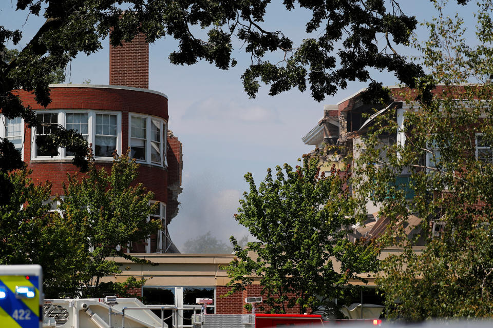 <p>Smoke hangs in the air as emergency personnel work the scene of school building collapse at Minnehaha Academy in Minneapolis, Minnesota, August 2, 2017. (Adam Bettcher/Reuters) </p>