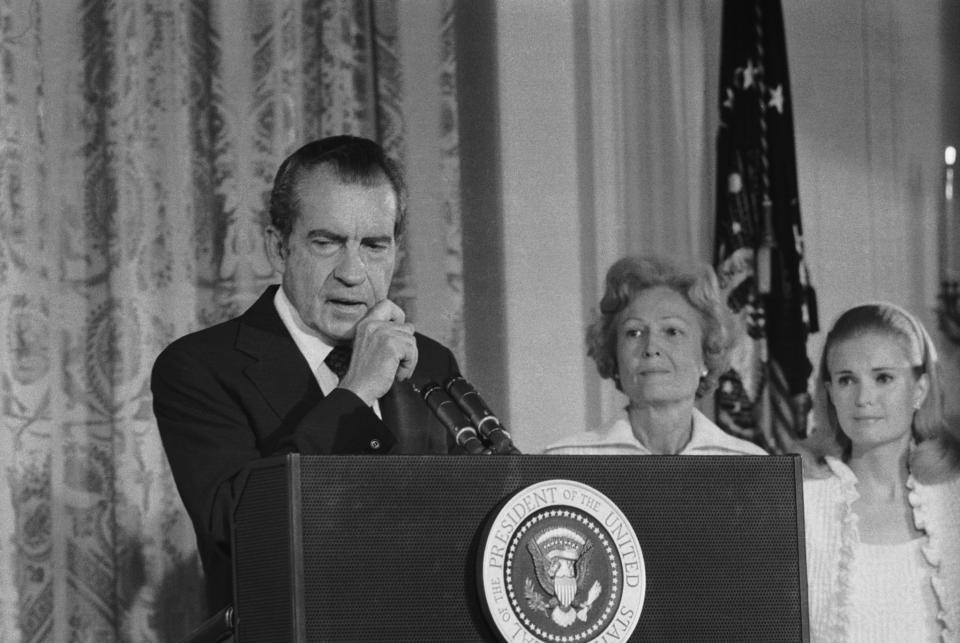 President Richard Nixon, with his wife, Pat, and daughter Tricia, delivers an emotional farewell to his staff at the White House after resigning from office. (Photo: Bettmann Archive/Getty Images)