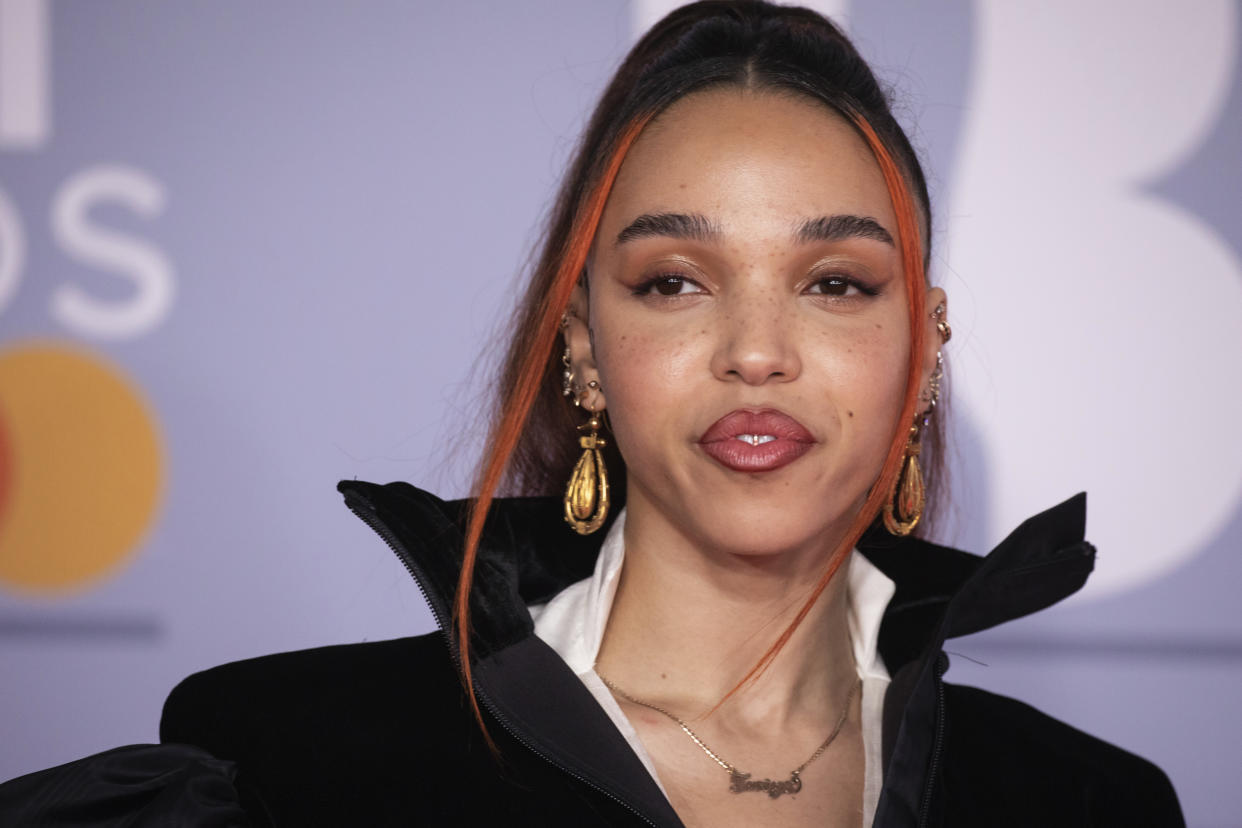 FKA Twigs poses for photographers upon arrival at Brit Awards 2020 in London, Tuesday, Feb. 18, 2020.(Photo by Vianney Le Caer/Invision/AP)