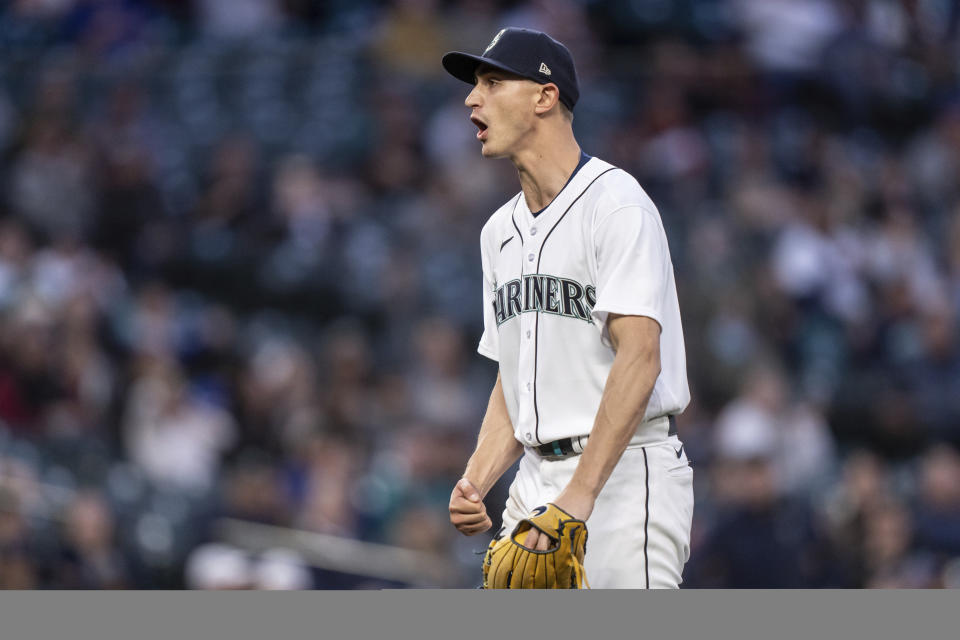 Seattle Mariners starting pitcher George Kirby walks off the field after the top of the seventh inning of the team's baseball game against the Texas Rangers, Tuesday, May 9, 2023, in Seattle. (AP Photo/Stephen Brashear)