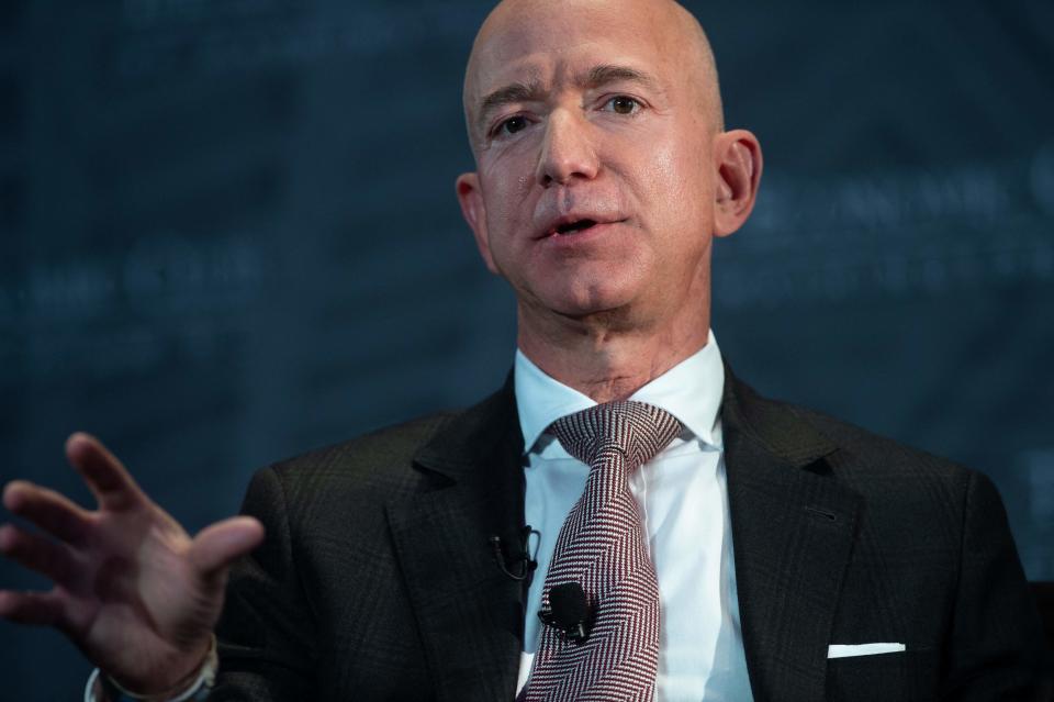 In this file photo taken on September 13, 2018, Jeff Bezos, founder and CEO of Amazon, speaks during the Economic Club of Washington's Milestone Celebration event in Washington, DC.