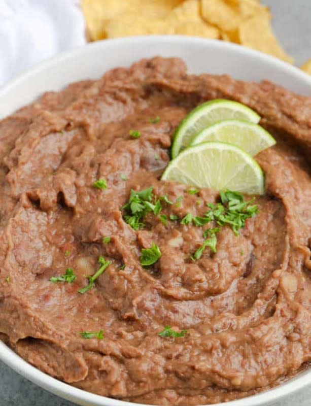 <p>Spend With Pennies</p><p>Homemade refried beans are even easier now.<br></p><p><strong>Get the recipe: <a href="https://www.spendwithpennies.com/homemade-refried-beans/" rel="nofollow noopener" target="_blank" data-ylk="slk:Slow Cooker Refried Beans;elm:context_link;itc:0;sec:content-canvas" class="link rapid-noclick-resp">Slow Cooker Refried Beans</a></strong></p>