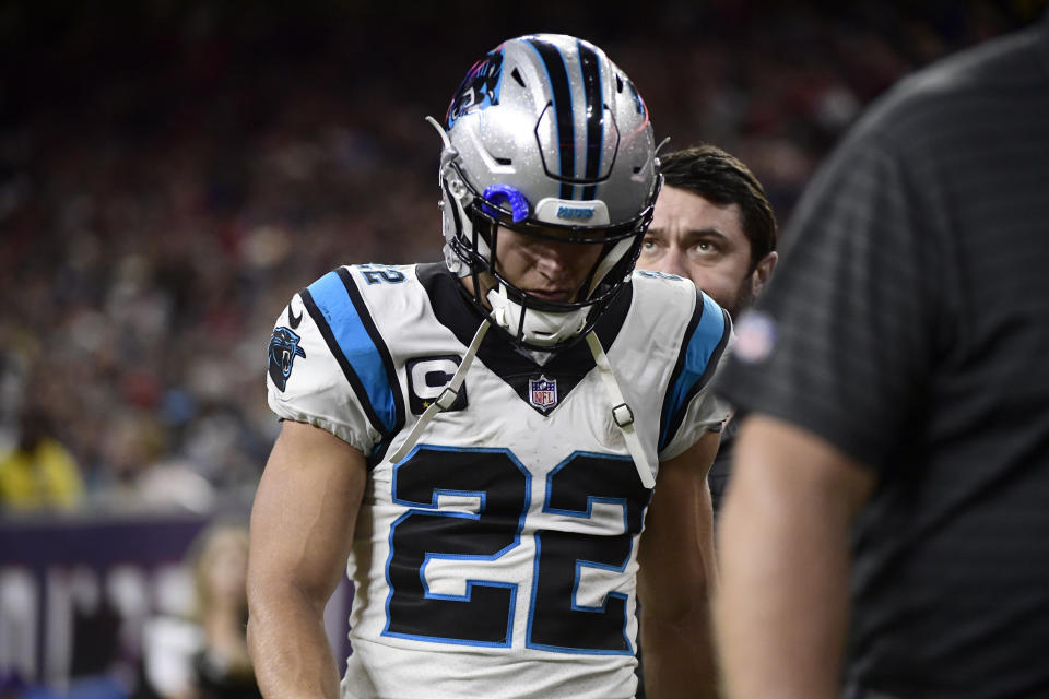 Carolina Panthers running back Christian McCaffrey (22) leaves the field during the first half of an NFL football game against the Houston Texans Thursday, Sept. 23, 2021, in Houston. (AP Photo/Justin Rex)