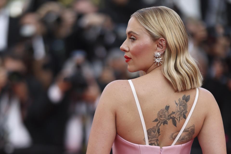 Scarlett Johansson poses for photographers upon arrival at the premiere of the film 'Asteroid City' at the 76th international film festival, Cannes, southern France, Tuesday, May 23, 2023. (Photo by Vianney Le Caer/Invision/AP)