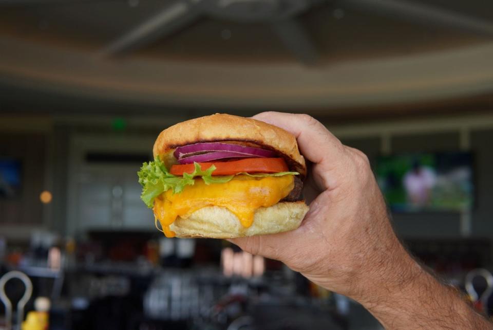 A favorite at the former NPB Public House, the tavern's cheeseburger remains on the menu after the restaurant merged with Farmer's Table at the North Palm Beach Country Club.