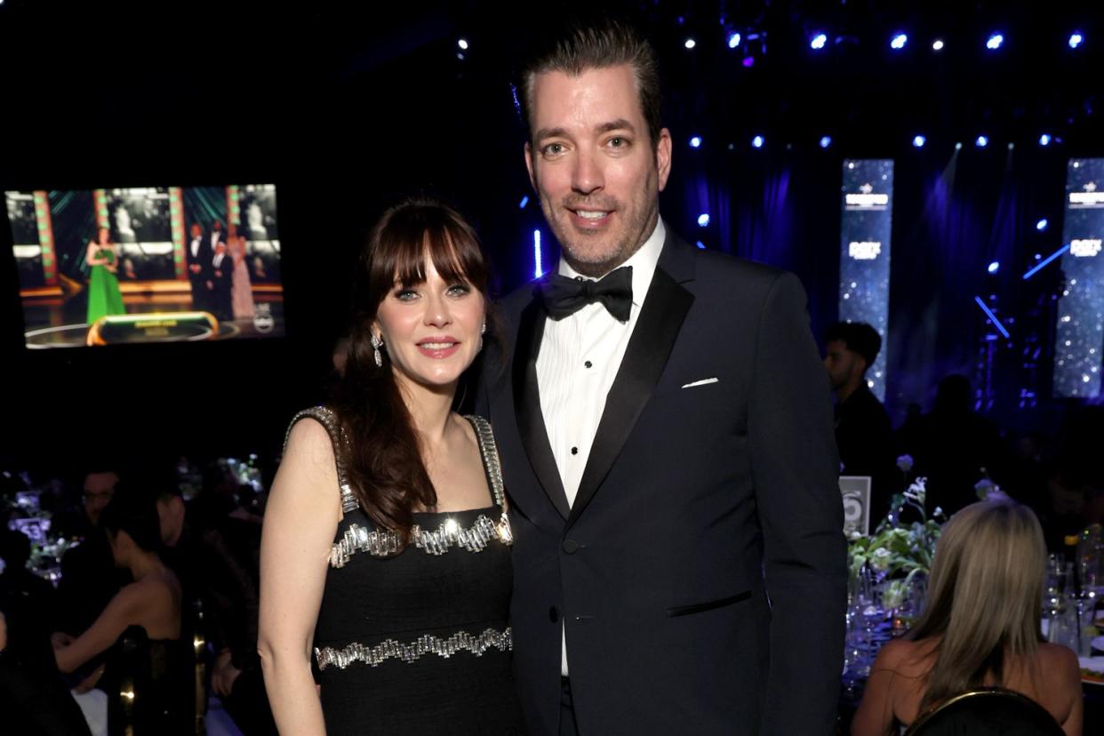 <p>Kevin Mazur/Getty</p> Jonathan Scott and Zooey Deschanel in March 2024 