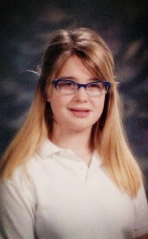 Kelly <a href="https://twitter.com/MissKellyO/status/337640887788126208" target="_blank">tweeted</a> this high school photo of herself with the caption, "#ThrowbackThursday Me in high school! I was such a dork!"   We think she was adorable.