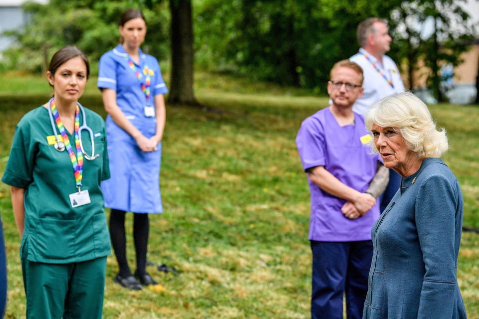 GLOUCESTER, ENGLAND - JUNE 16: Camilla, Duchess of Cornwall chats with NHS staff and front line key workers who who have responded to the COVID-19 pandemic during a visit to Gloucestershire Royal Hospital on June 16, 2020 in Gloucester, England. (Photo by WPA Pool-Ben Birchall/Getty Images)