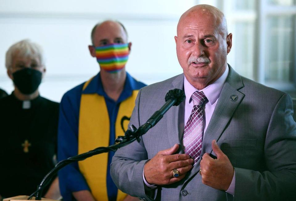 Fresno Mayor Jerry Dyer, right, in a reversal of an earlier decision, announces plans to raise the Pride flag at one of Fresno City Hall’s three flag poles later this month during a press conference Friday afternoon, June 4, 2021 in Fresno.